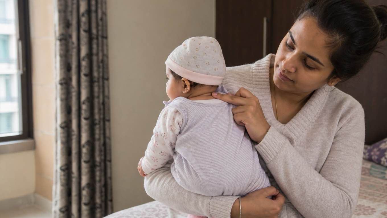 Winter with a baby: warmth without overheating, and the season's real risks